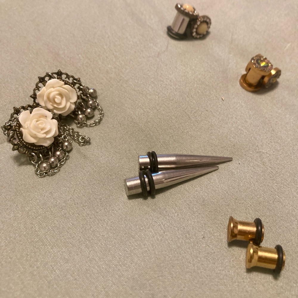 23 Pairs of size 2 Gauge Earrings